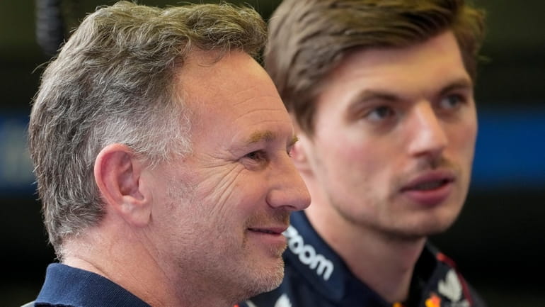 Red Bull team principal Christian Horner, left, and Red Bull...