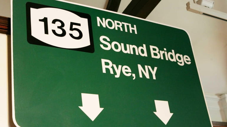 A rendering of a highway sign for a bridge that...