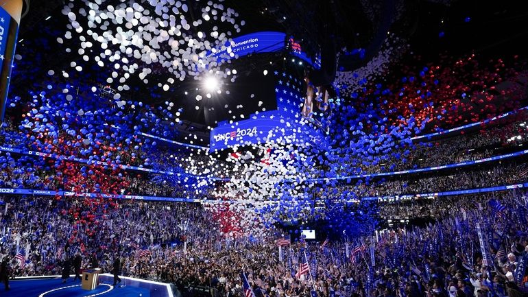 The balloon drop during the Democratic National Convention Thursday, Aug....