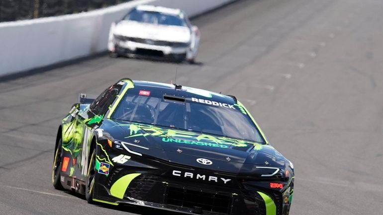 Tyler Reddick drives into a turn during a practice session...