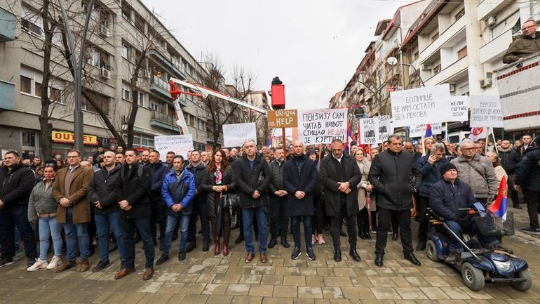 Kosovo Serbs protest against a ban of the use of...