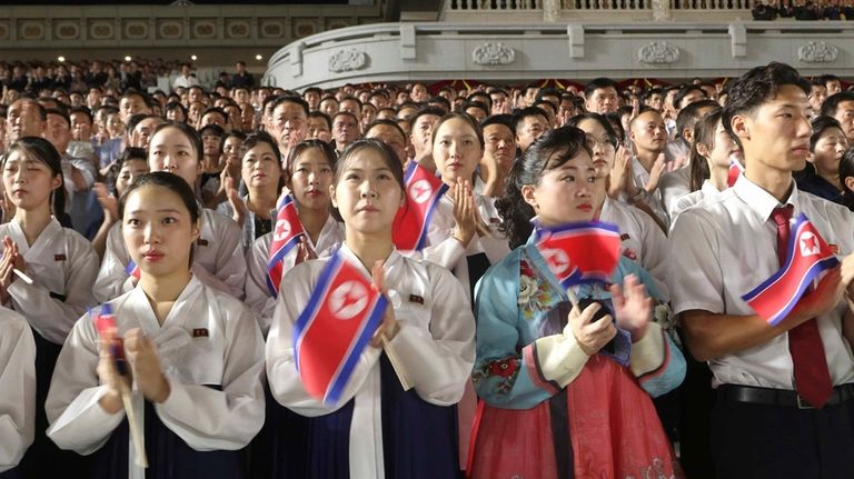 North Koreans celebrate the country's 76th founding anniversary at Kim...