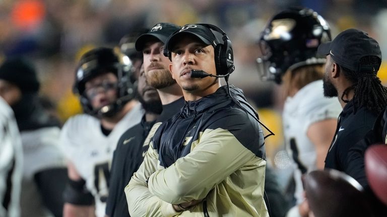 Purdue head coach Ryan Walters watches an NCAA college football...