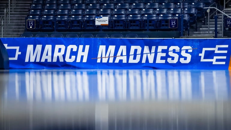 March Madness branding near the court before a first-round college...