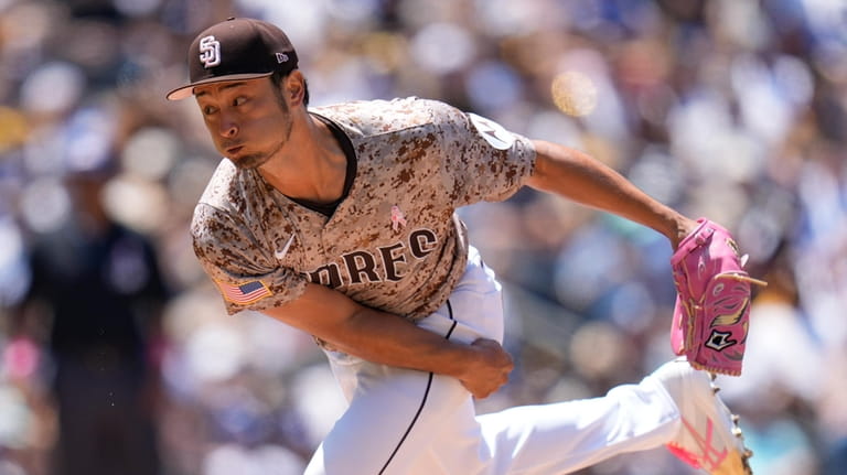 San Diego Padres starting pitcher Yu Darvish works against a...