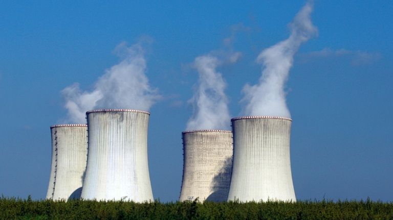 Four of the cooling towers of the Dukovany nuclear power...