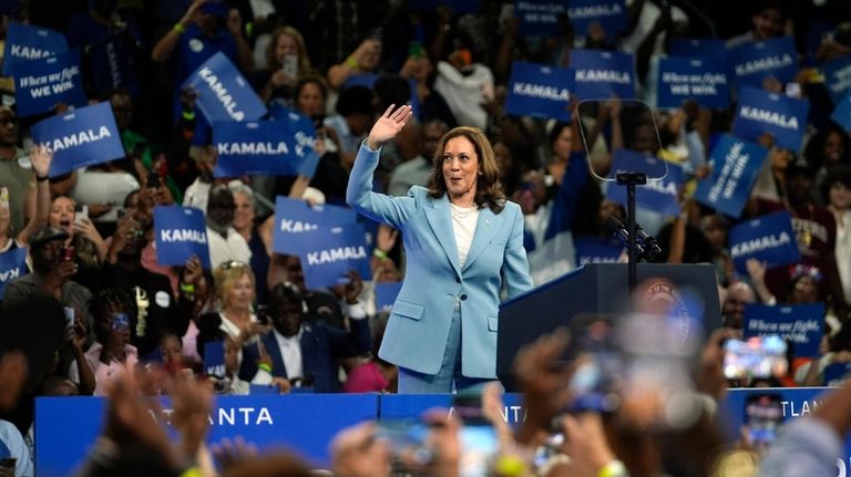 Vice President Kamala Harris arrives to speak during a campaign...