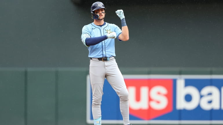 Tampa Bay Rays' Josh Lowe celebrates his double against the...