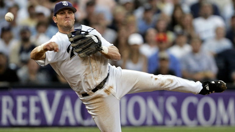 FILE- San Diego Padres third baseman Sean Burroughs fires a...