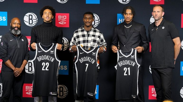 From left, Nets coach Jacque Vaughn, draft picks Jalen Wilson, Dariq...