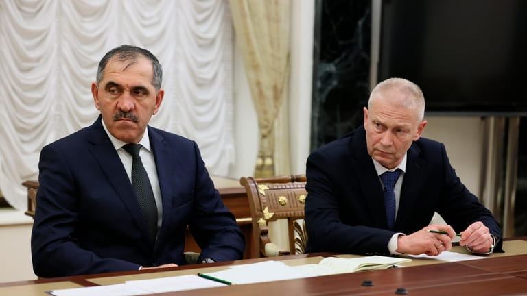 Russian Deputy Defense Minister Yunus-Bek Yevkurov, left, and Chairman of...