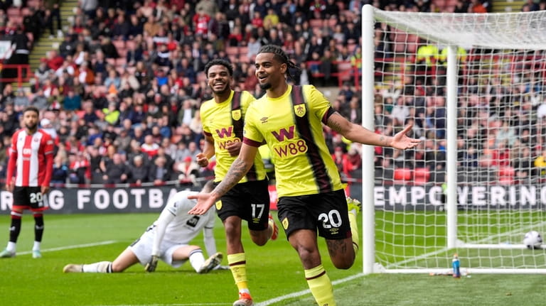 Burnley's Lorenz Assignon celebrates scoring their side's second goal of...