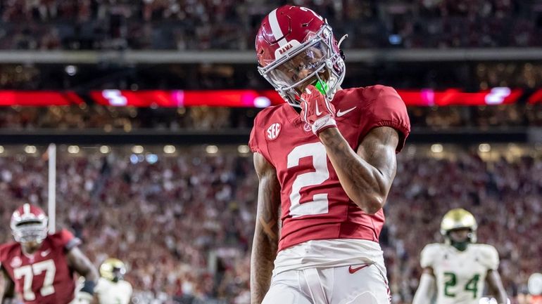 Alabama wide receiver Ryan Williams (2) reacts after his touchdown...