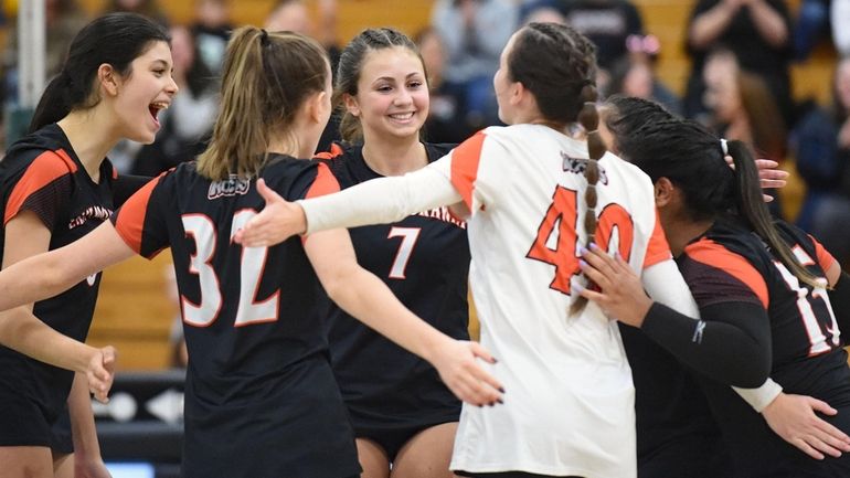 Nicole Zugnoni of East Rockway, left, and Grace Buffetti, third...