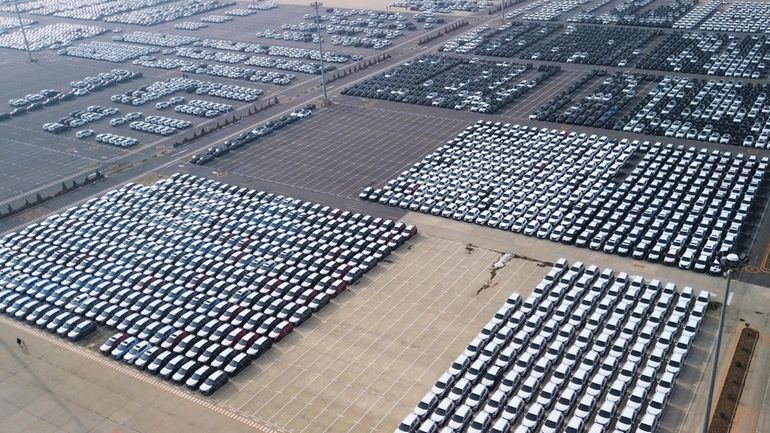 Vehicles at a terminal of Dalian Port, northeast China's Liaoning...