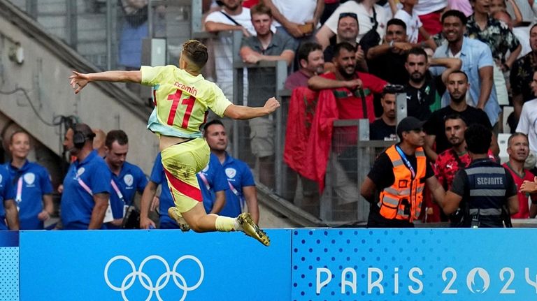 Spain's Fermin Lopez celebrates is side's first goal during a...