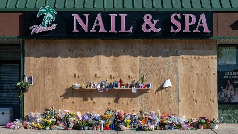 The boarded-up Hawaii Nail & Spa in Deer Park on...