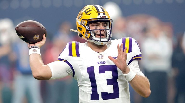 LSU quarterback Garrett Nussmeier looks to pass during the first...