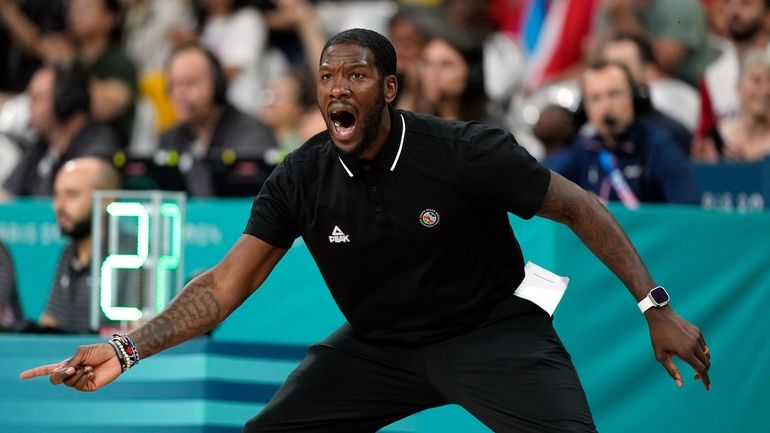 South Sudan head coach Royal Ivey gestures in a men's...