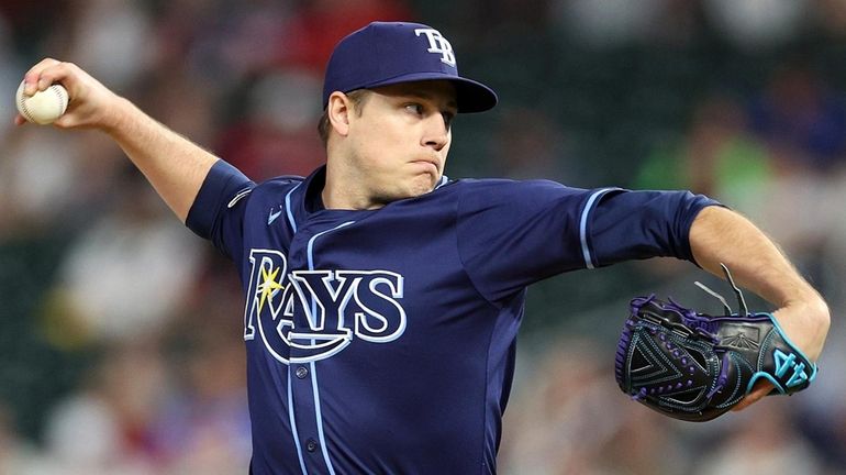 Phil Maton of the Rays delivers a pitch against the Twins...