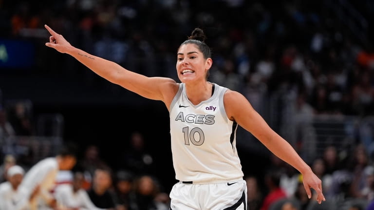 Las Vegas Aces guard Kelsey Plum gestures during the first...