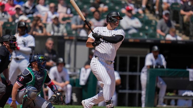 Chicago White Sox's Gavin Sheets hits a double during the...