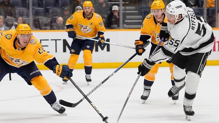 Los Angeles Kings right wing Quinton Byfield (55) hits the...