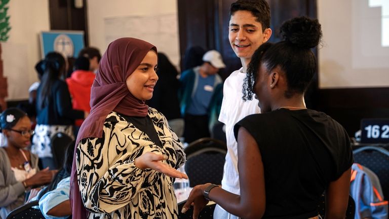 Heba Elkouraichi, left, Michael Nisimov, middle, and Chris-Ann Barnett, right,...