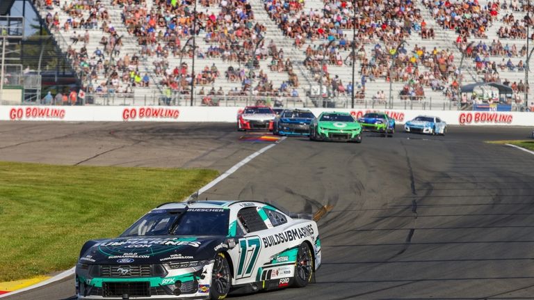 Chris Buescher (17) competes in a NASCAR Cup Series auto...