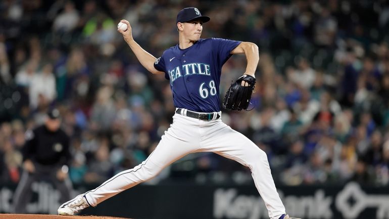 Seattle Mariners starting pitcher George Kirby throws to a Houston...