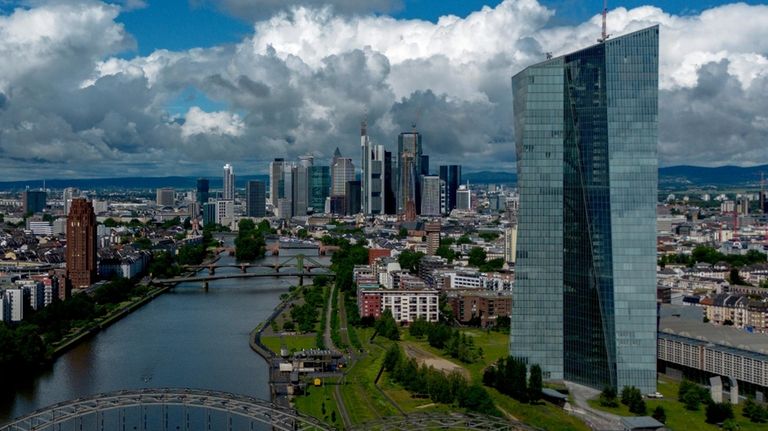 Clouds cover the sky over the banking district with the...