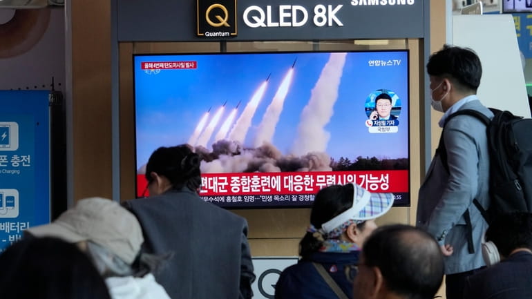 A TV screen shows a file image of North Korea's...