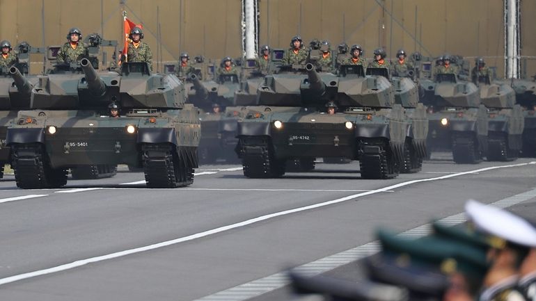 The Japan Ground Self-Defense Force tanks parade during the Self-Defense...