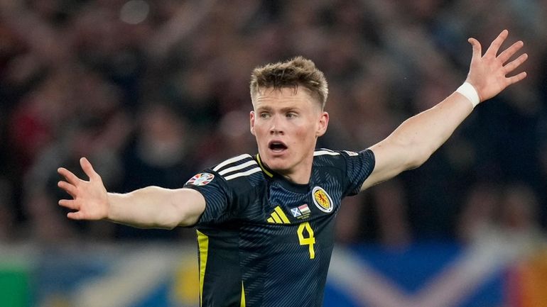 Scotland's Scott McTominay reacts during a Group A match between...