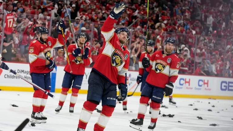 Florida Panthers players acknowledge cheers from the fans at the...