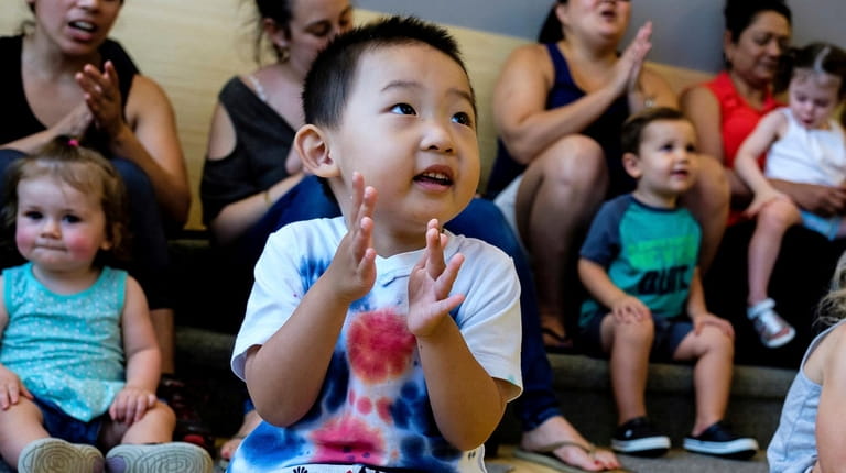 Remi Sun, 3, of Manhasset, attends Sing and Swing Story...
