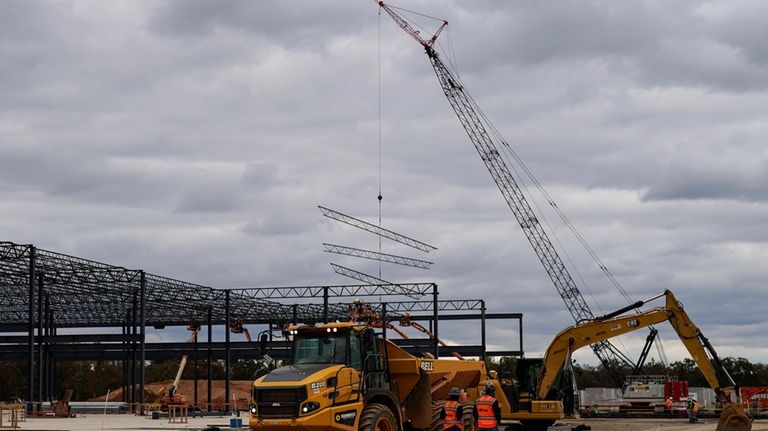 A Caterpillar truck is seen outside a Hanwha QCells Solar...