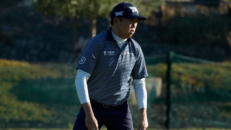 David Lipsky reacts after making a birdie putt on the...