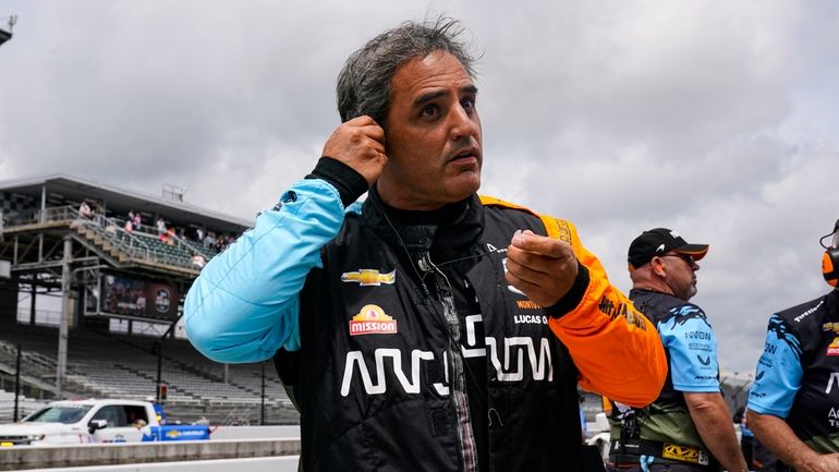 Juan Pablo Montoya, of Colombia, prepares to drive before the...