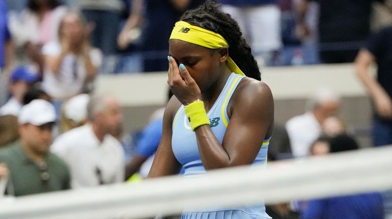 Coco Gauff, of the United States, reacts after losing to...