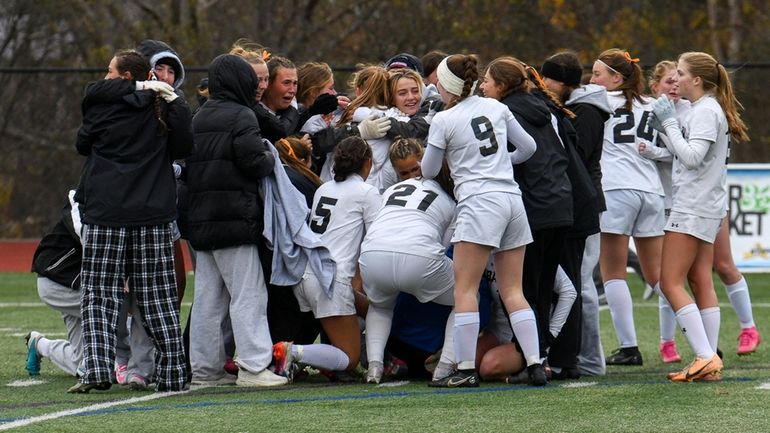 Babylon celebrates its victory over Saranac in the state Class B...