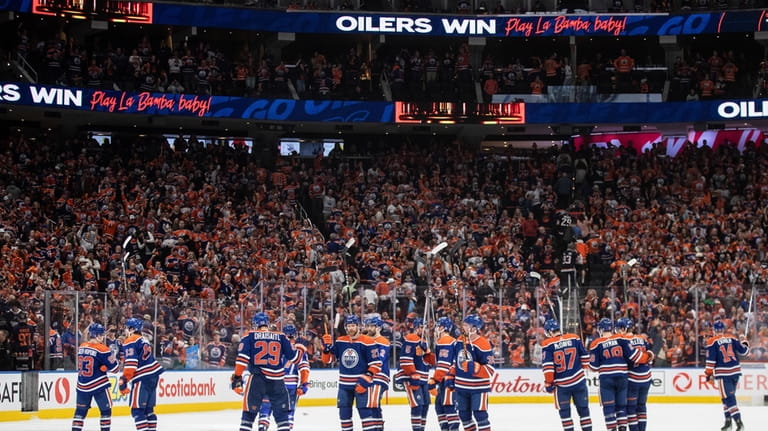 Edmonton Oilers celebrate the win over the Vancouver Canucks in...