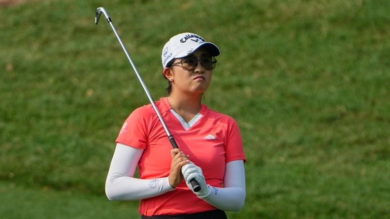 Rose Zhang of the United States watches her shot on...