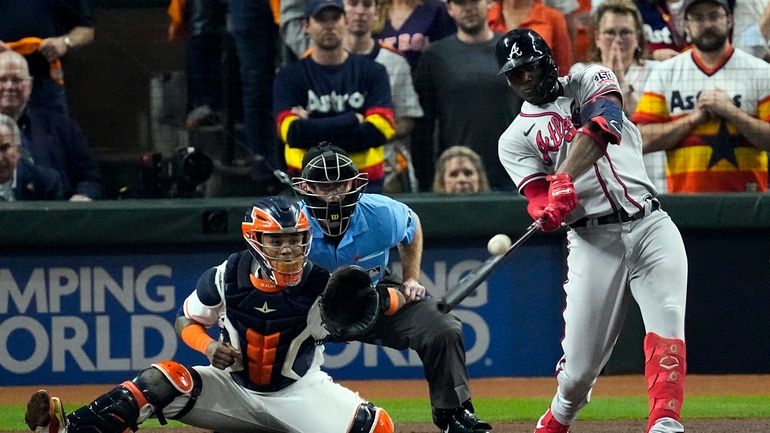 Atlanta Braves' Jorge Soler hits a three-run home run during...