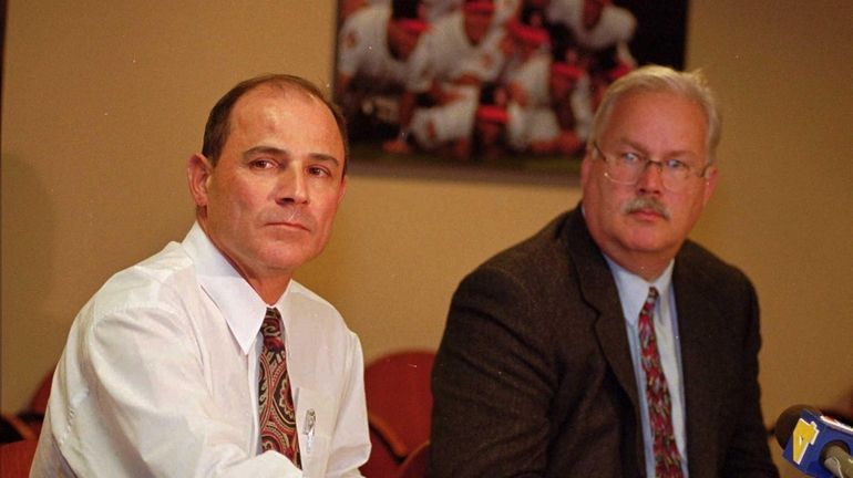 Anaheim Angels general manager Bill Stoneman, left, and Angels team...