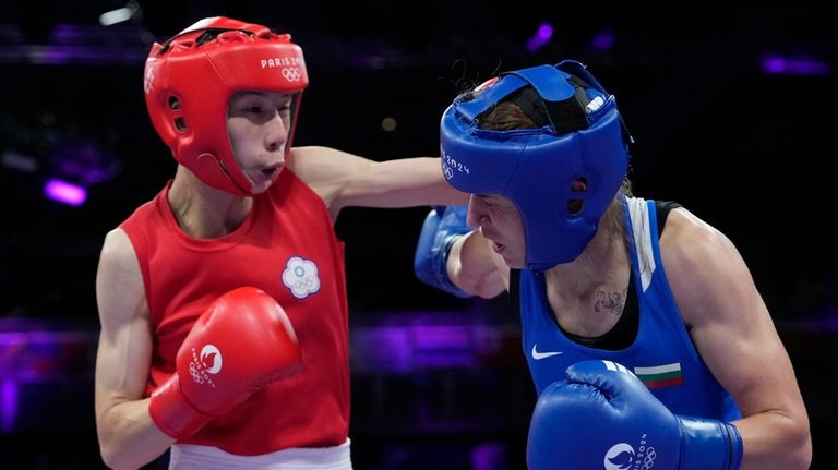 Taiwan's Lin Yu-ting, left, fights Bulgaria's Svetlana Staneva in their...