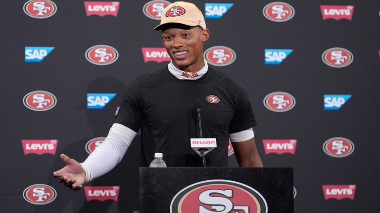 San Francisco 49ers quarterback Joshua Dobbs speaks at a news...