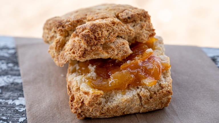 A buttermilk biscuit with orange marmalade at Main Road Biscuit...