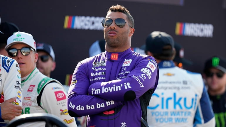 Bubba Wallace looks on before driver introductions at a NASCAR...