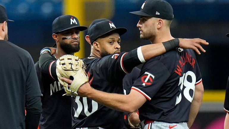 Minnesota Twins left fielder Matt Wallner (38) celebrates with first...